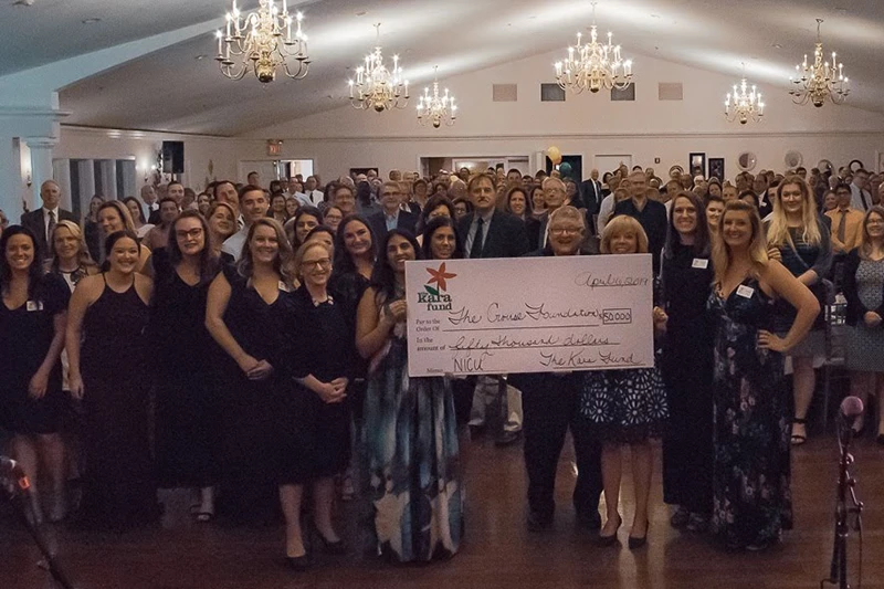 Crouse Foundation check to support the Family Lounge Center at the NICU